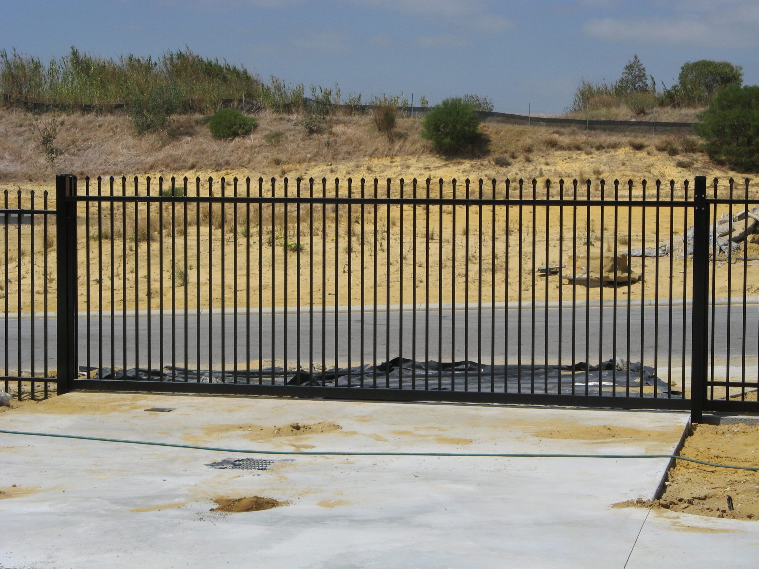 Sliding Black Garrison Gate Includes posts, brackets, rollers, stop post & track